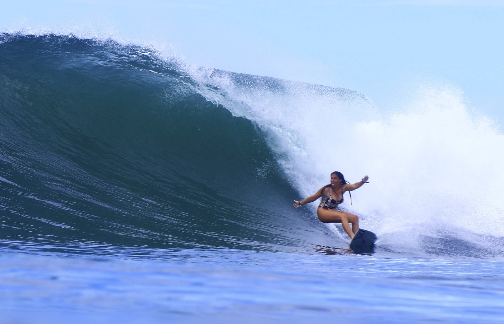 Maya Karl surfing in El Salvado