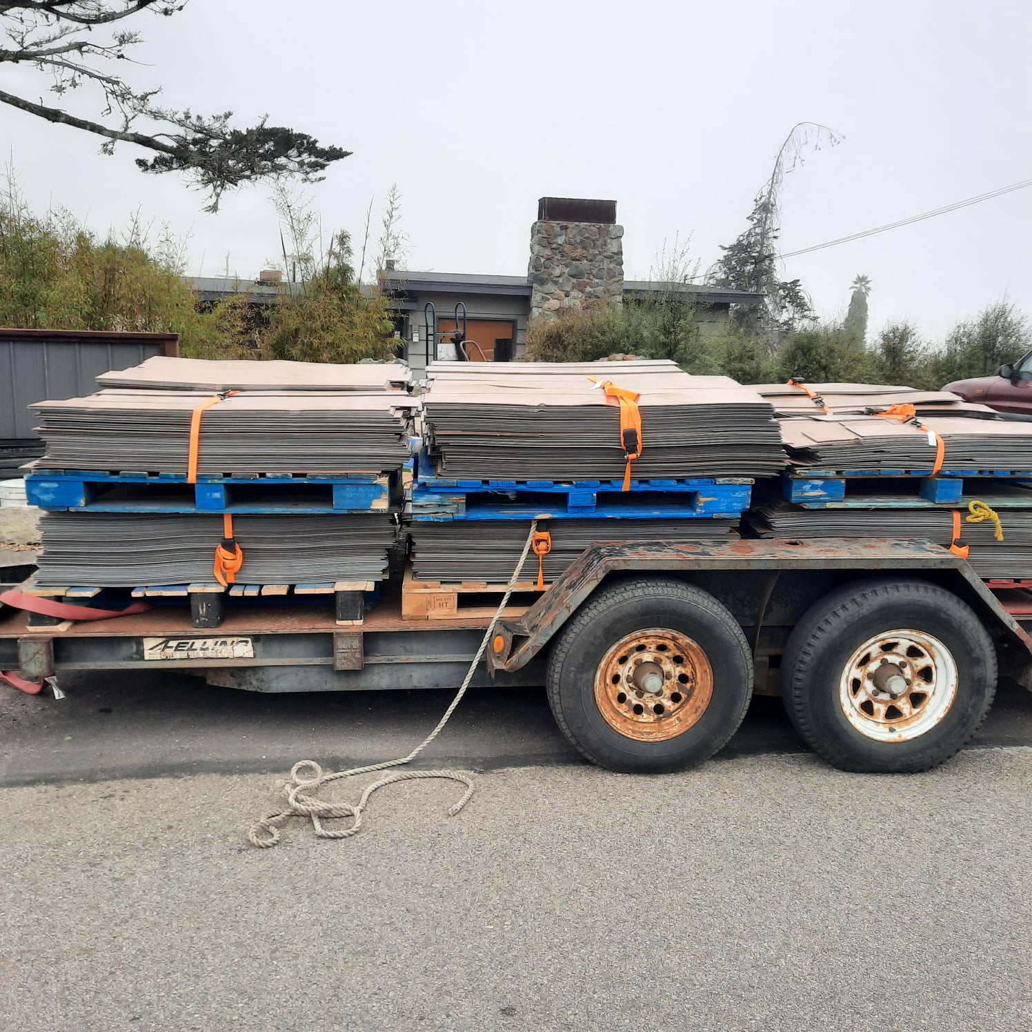 A pallet of flooring materials prepared for haul