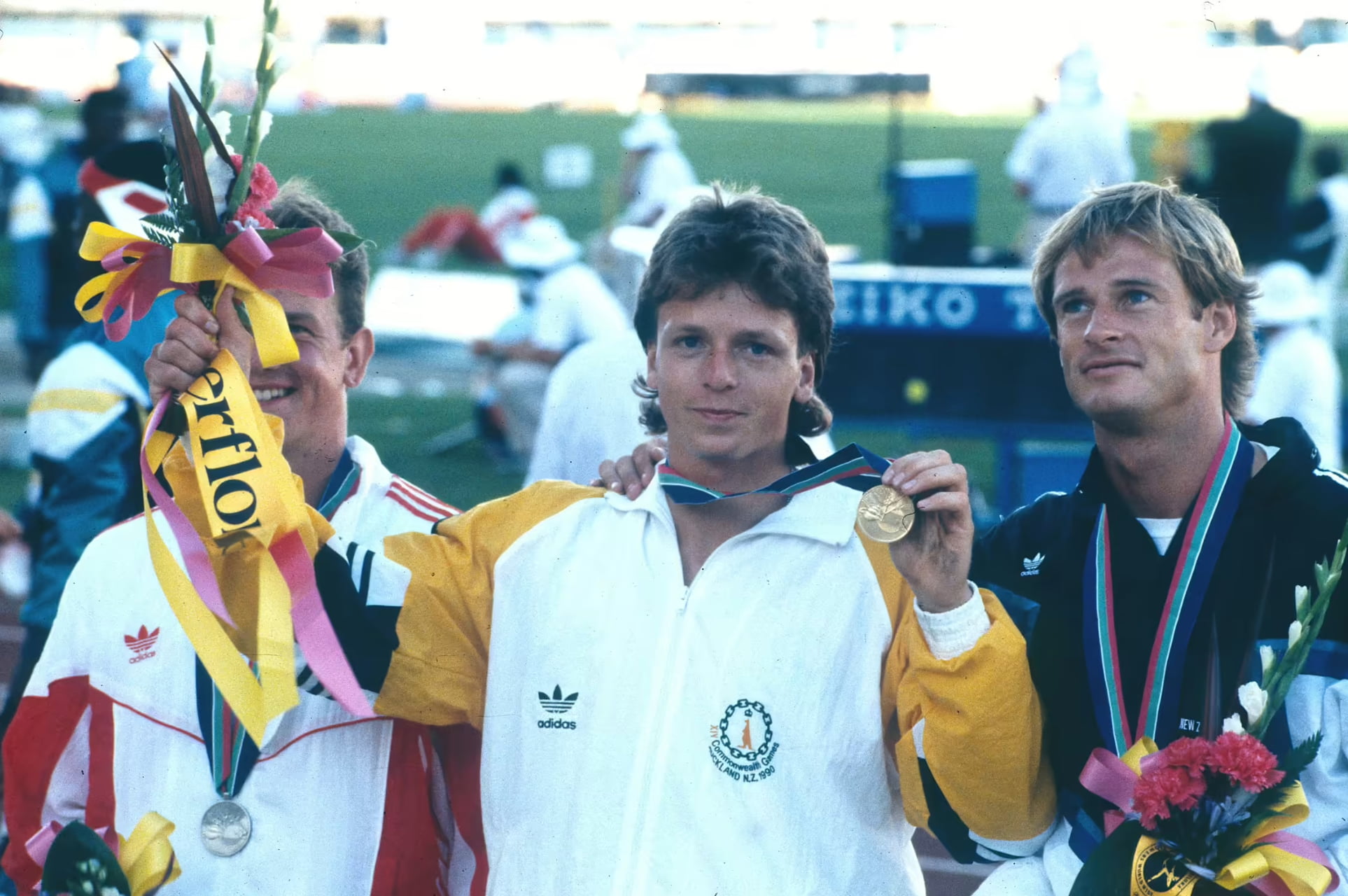 Simon Arkell displays a medal he earned from pole vaulting