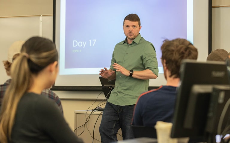 Associate Professor Jim Burleson addressing a class
