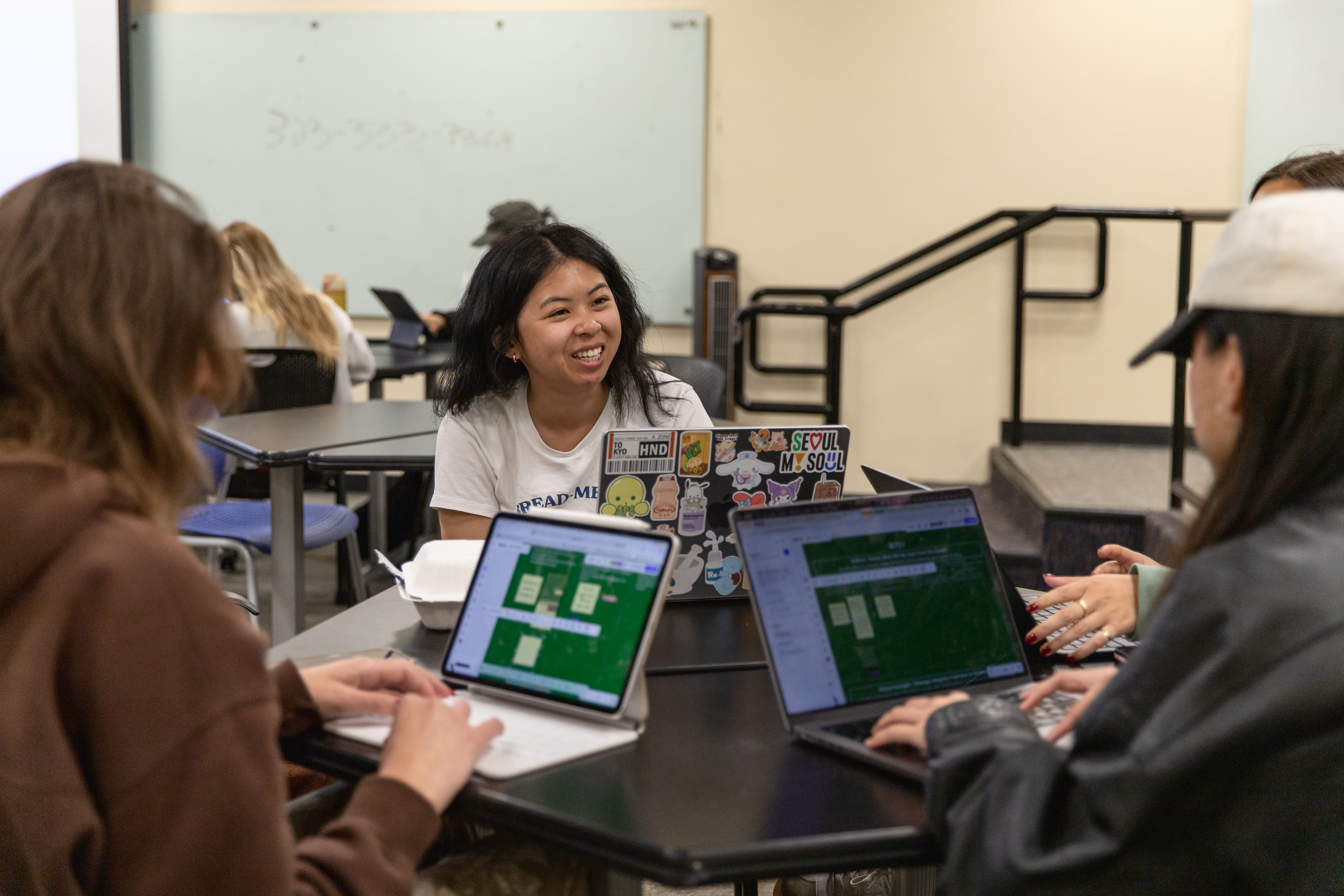 Students collaborate on a class project