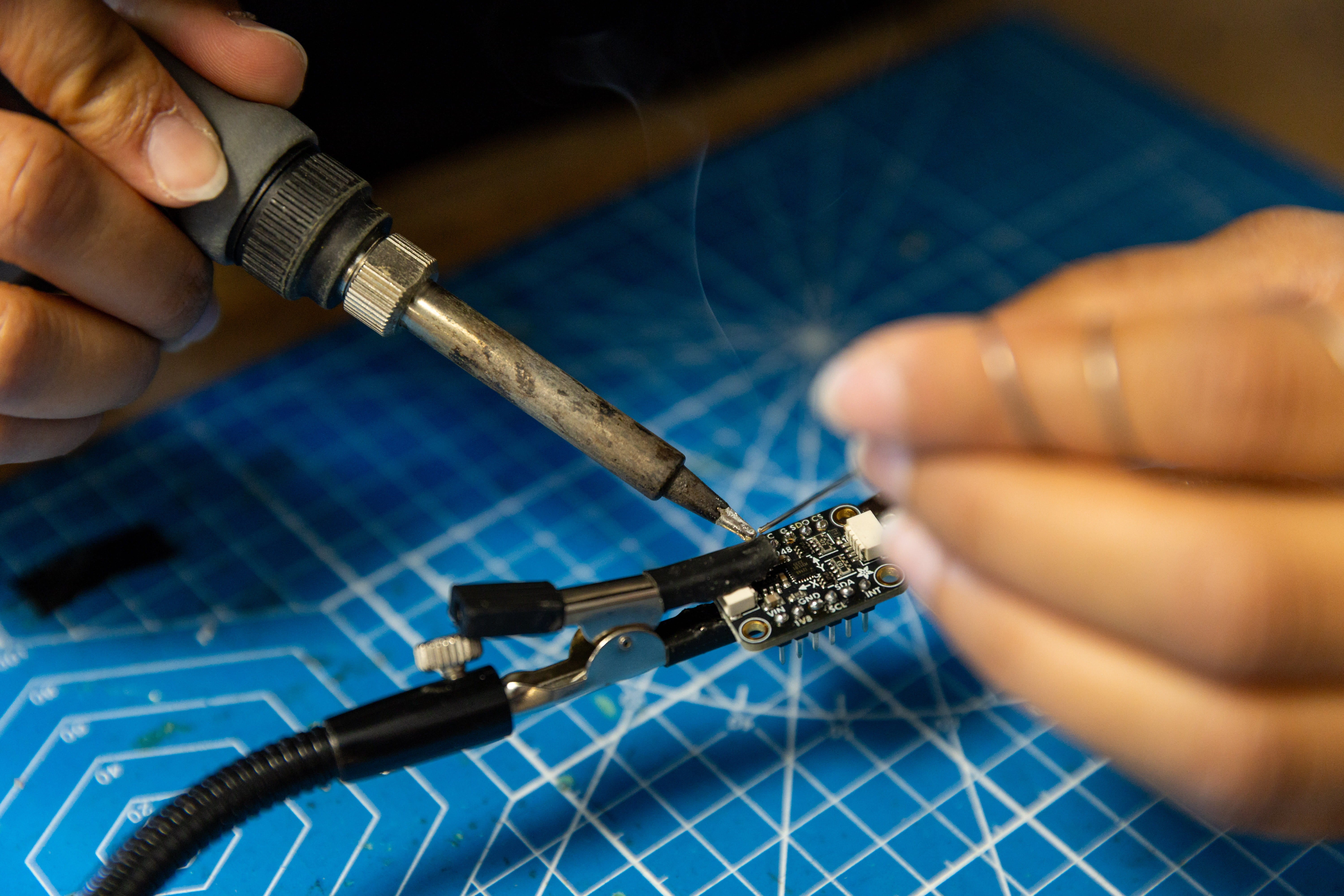 Detail shot of hand soldering 