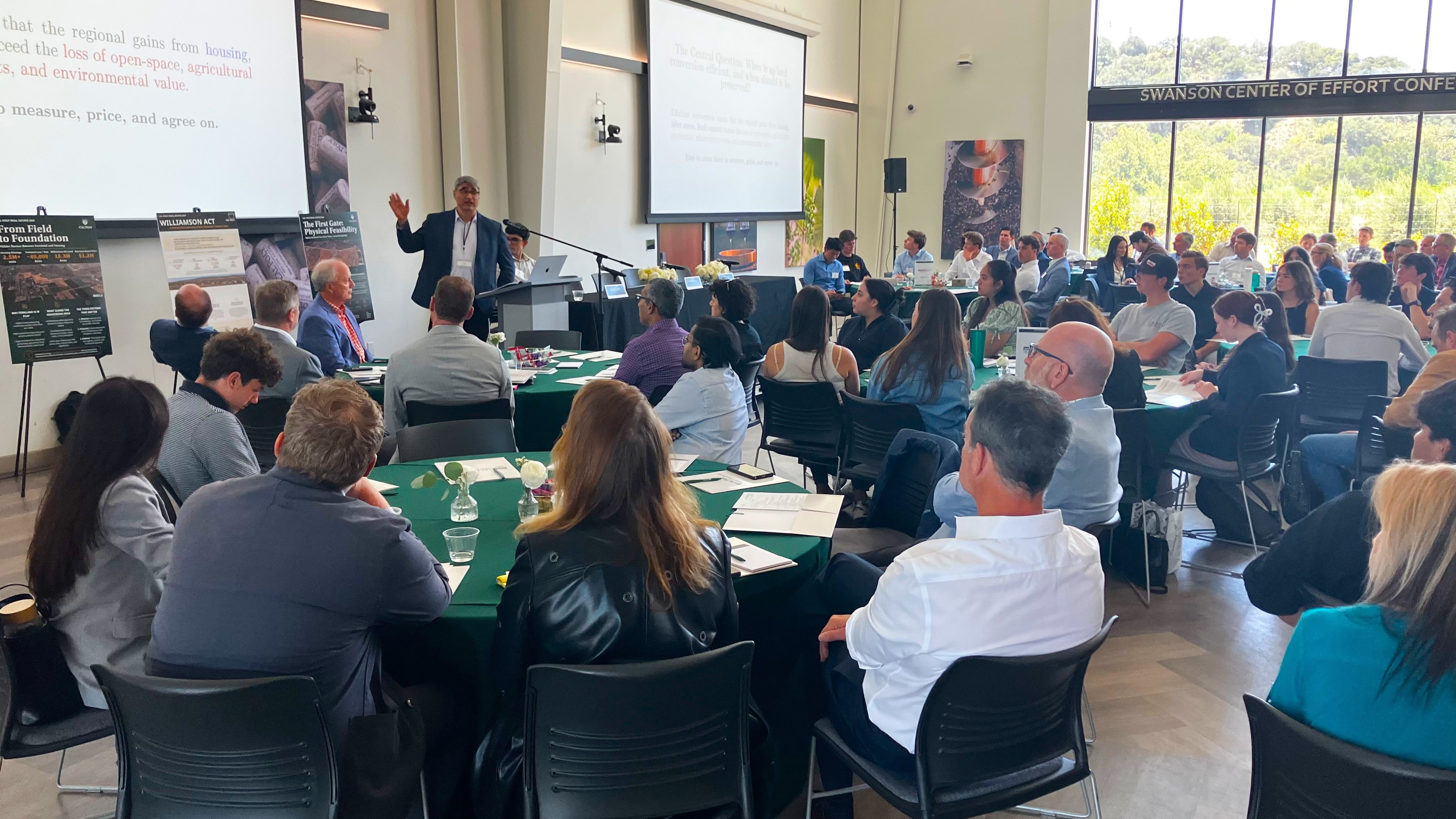 Hamed Ghoddusi speaks during Real Estate Day