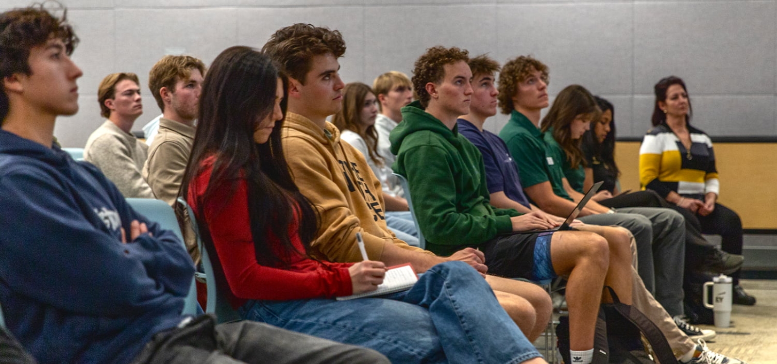 An audience watches a virtual chat with Marc Lore