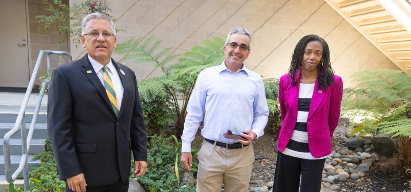 Professor Stephen Hamilton (center) with Cal Poly President Jeffrey D. Armstrong (left) and Provost Cynthia Jackson-Elmoore (right).