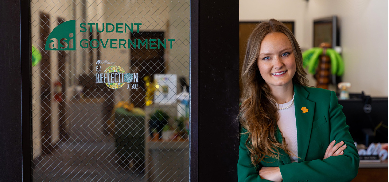 Ashleigh Spragins poses for a portrait outside the ASI office