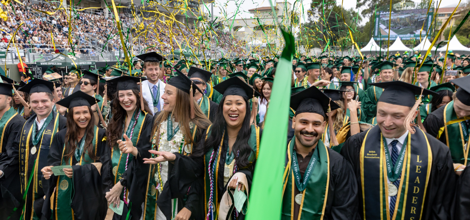 New grads celebrate during their commencement ceremony