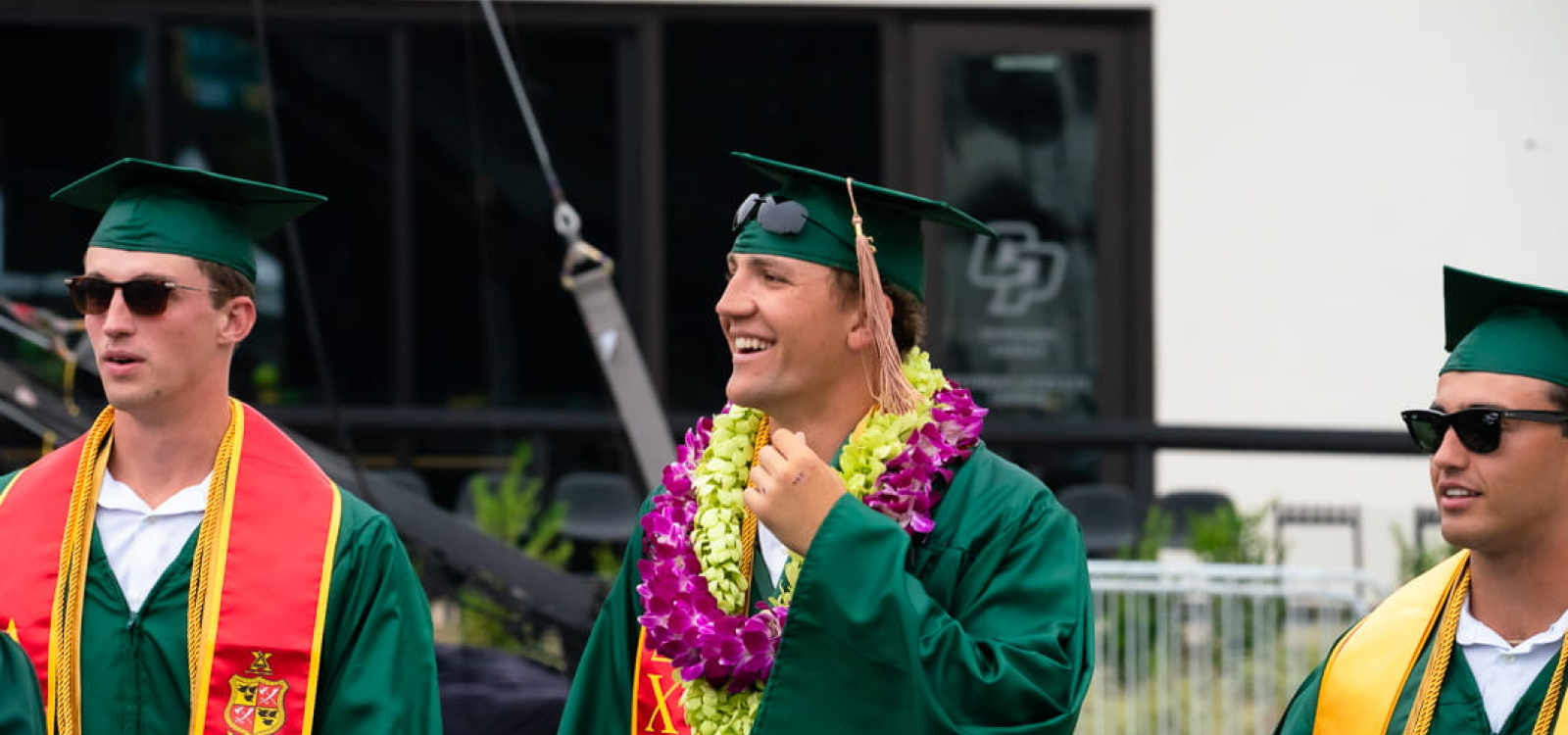  A graduating student offers a jubilated fist