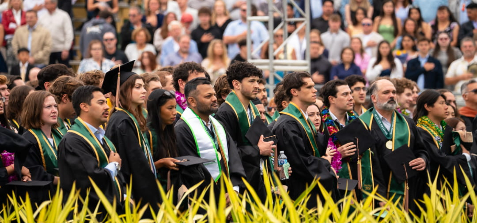 Graduating students listen to commencement ceremonies