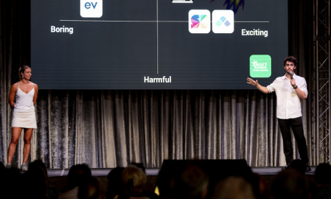 Startup owners discuss their app during an event