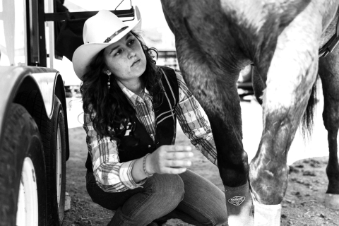 Layla Hanna prepares her horse for practice