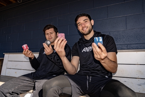 Photo of Michael Goldfeder and Justin Siegel showing their athletic tape designs
