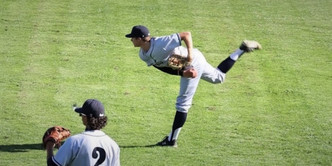 Blues pitcher Ryan Baum warming up before a game.
