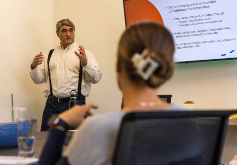 Hamed Ghoddusi, speaking to real estate professionals