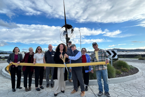 Erica A Stewart heads a ribbon cutting ceremony unveiling public art in San Luis Obispo