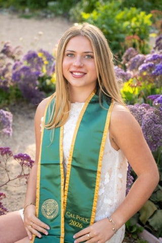 Annie Bosche poses for a graduation photo