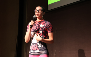 A student desrcibes her business idea during the Elevator Pitch competition