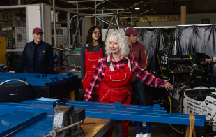 Ronda Beaman talks to students at the Aero Hangar on the Cal Poly campus