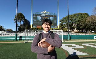 Spencer Zhang, on the football field at Spanos Stadium