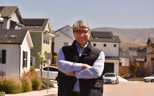 Hamed Ghoddusi portrait in a housing development
