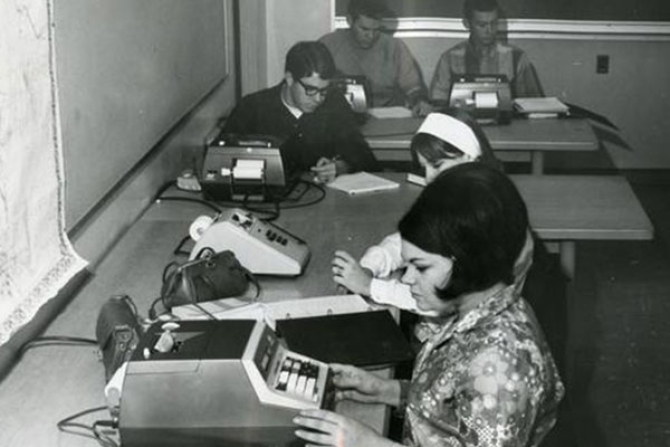 Historic photo of students in computer lab