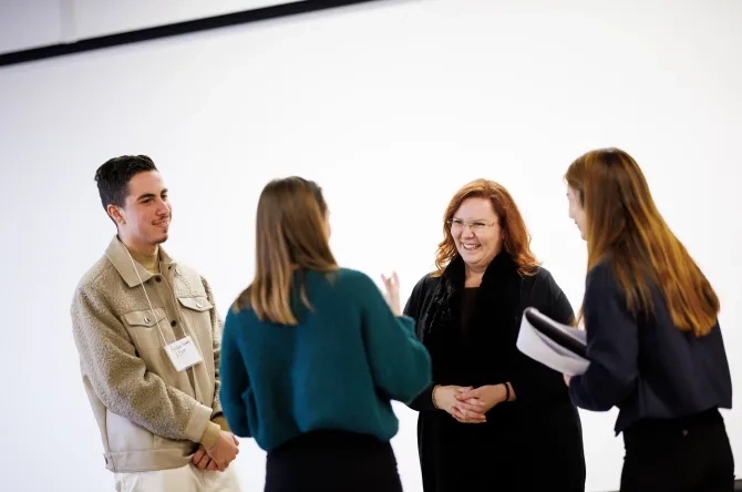 Students and faculty talking