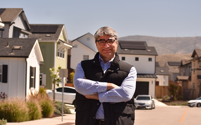 Hamed Ghoddusi portrait in a housing development