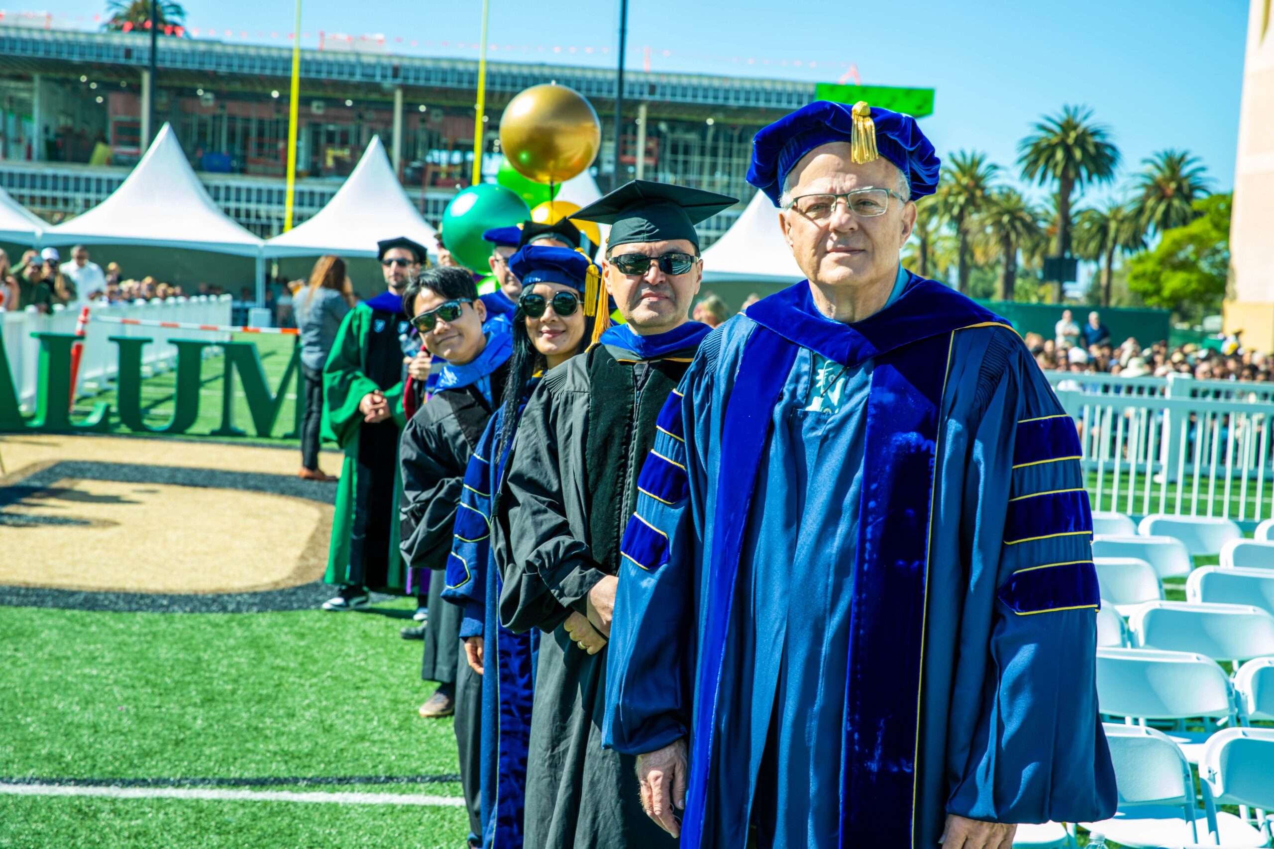faculty dressed in commencement robes