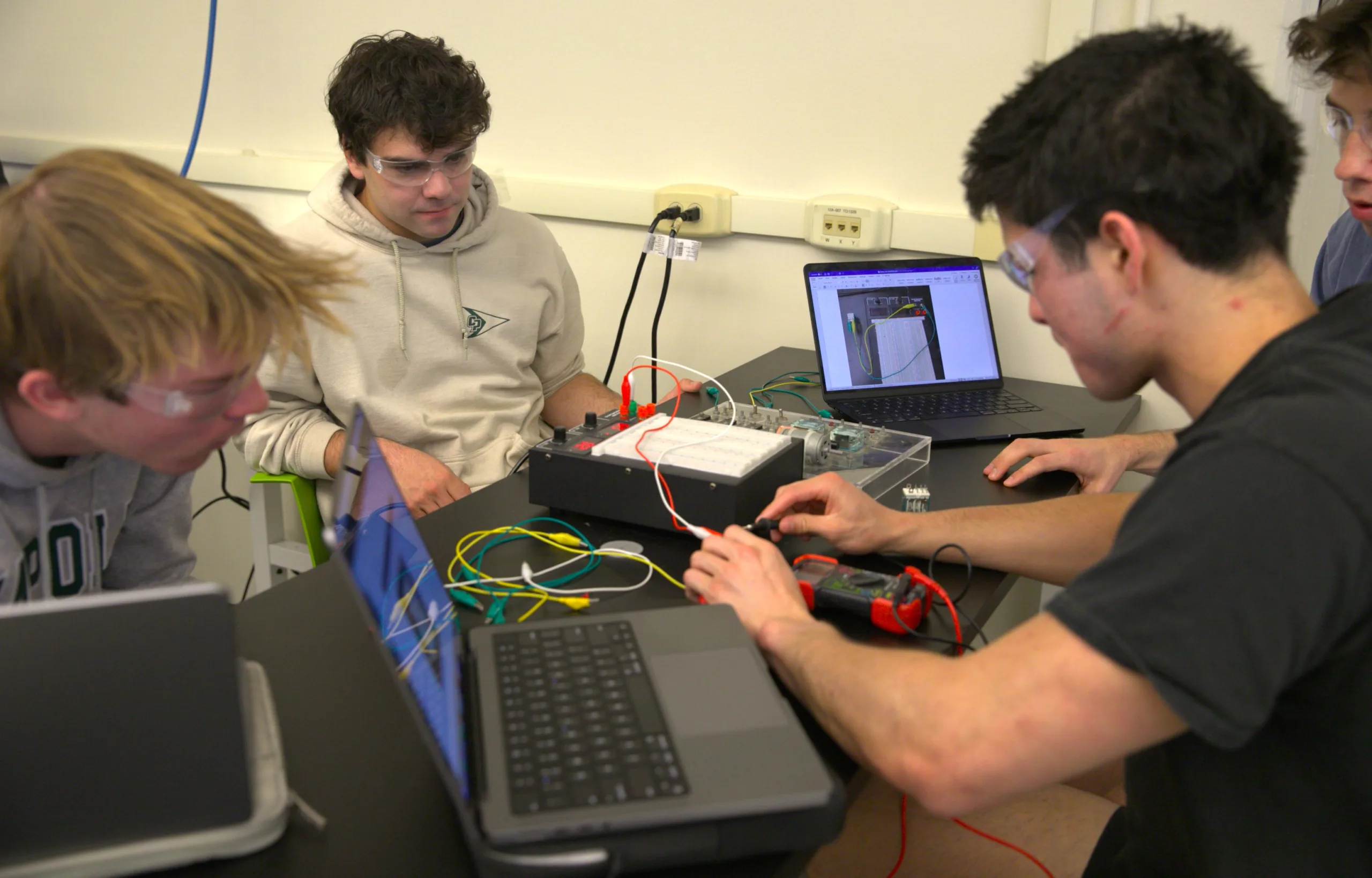 Students work on an electrical project