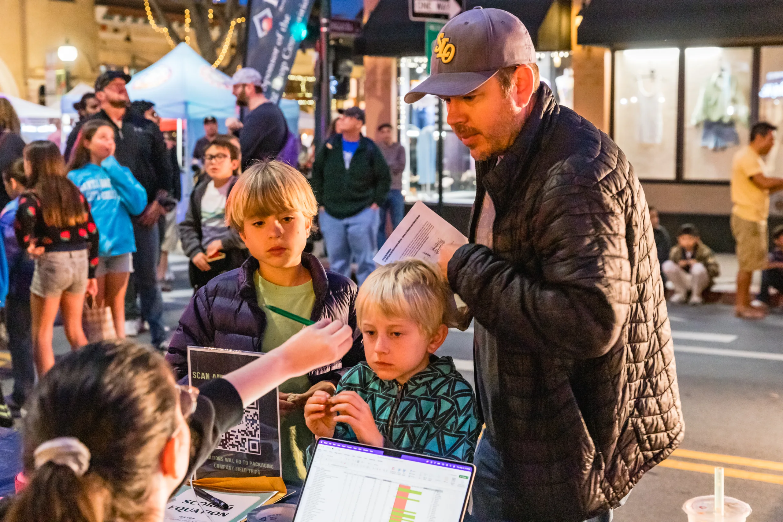 A family signs up for the egg drop contest