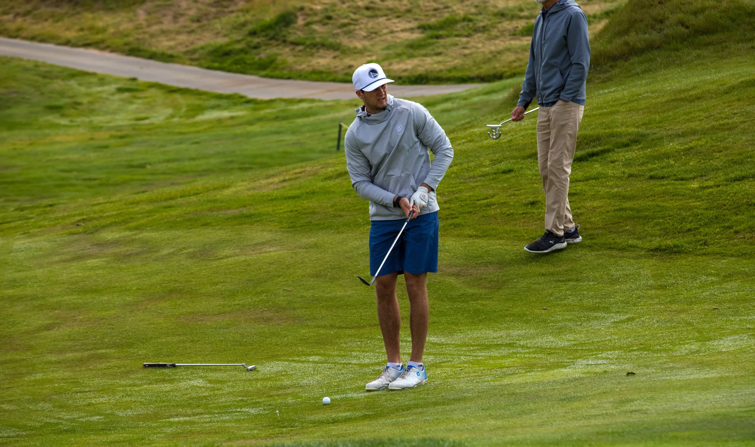 A golfer considers his shot