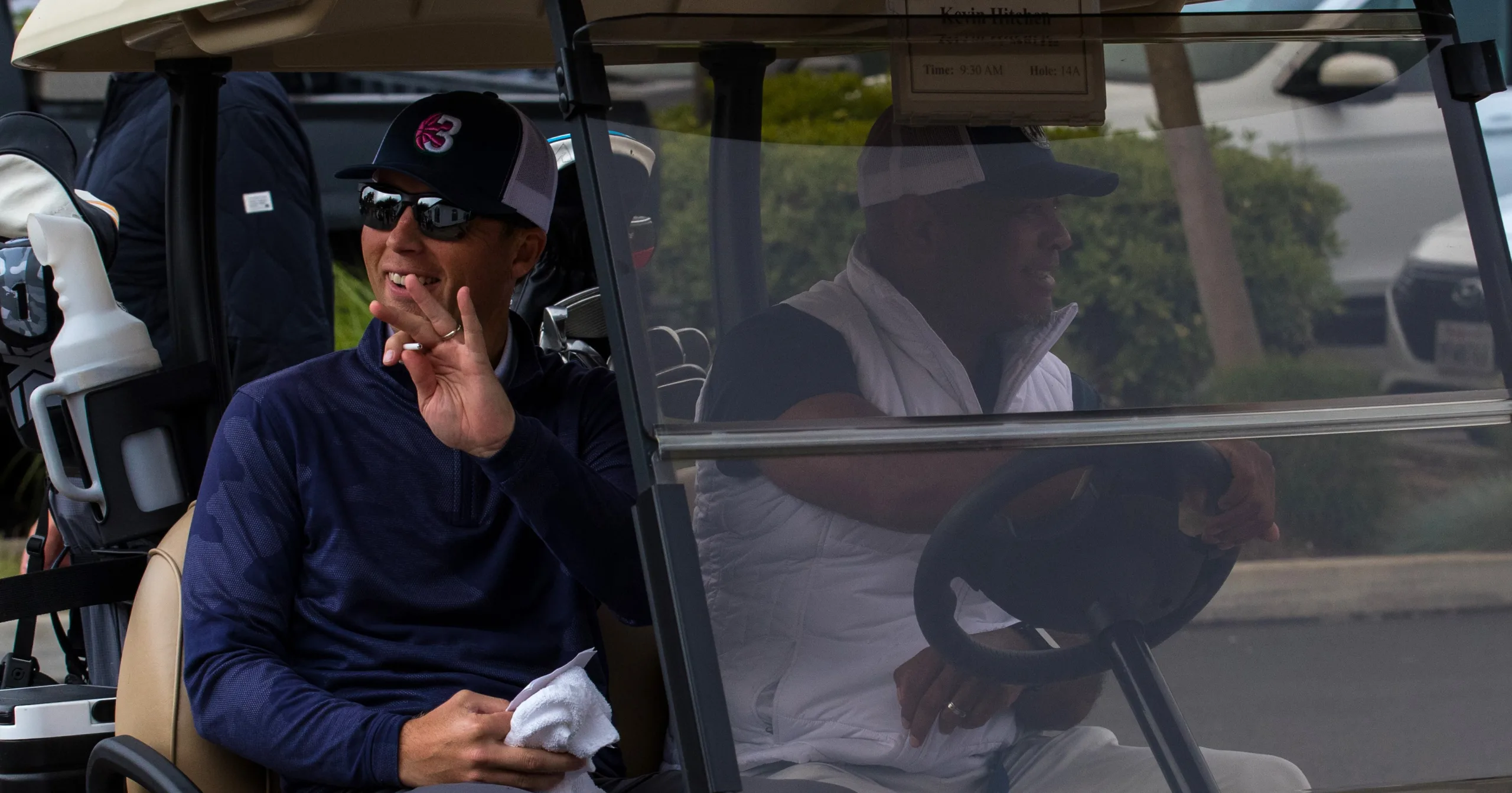 Golfers in a golf cart