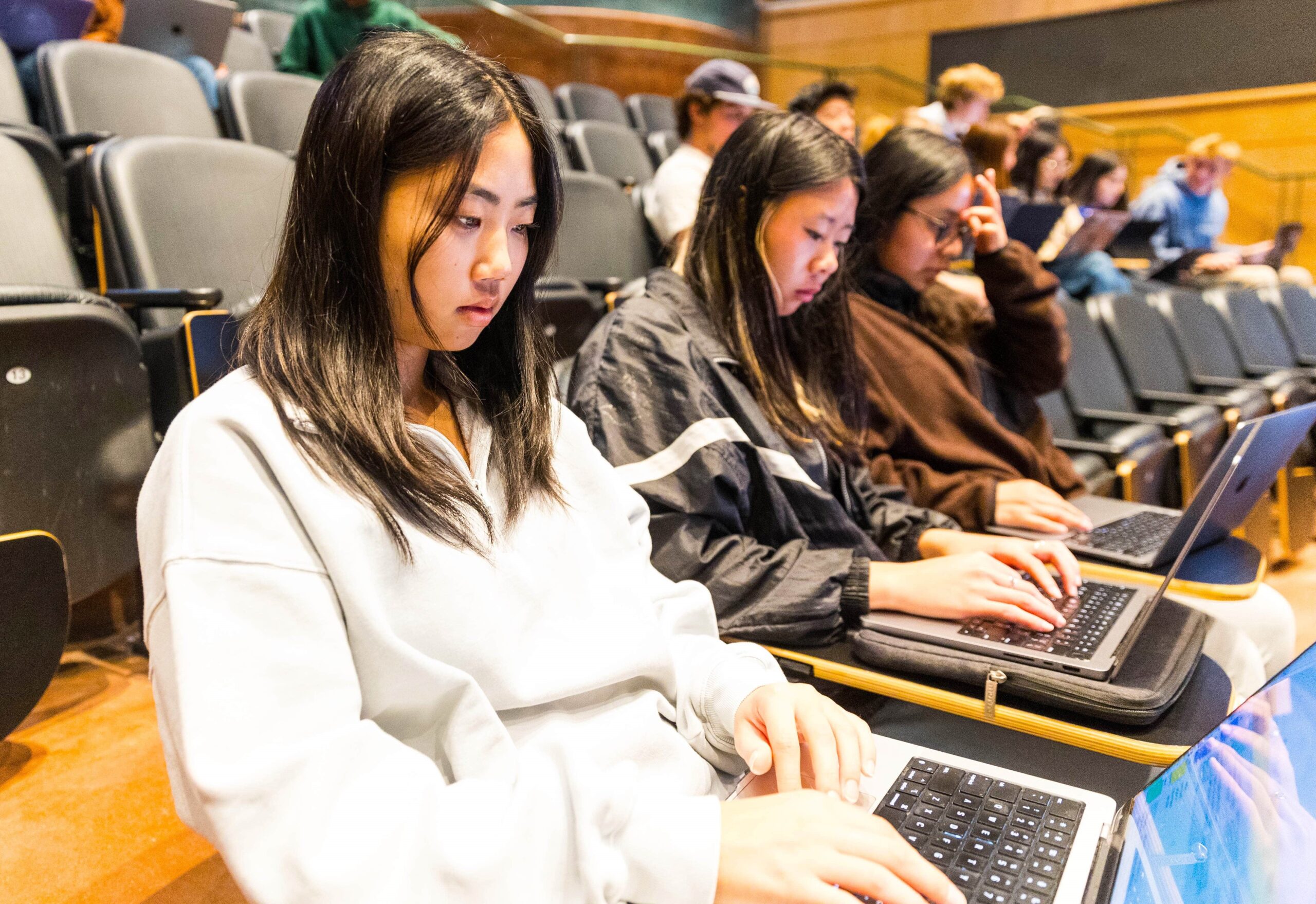 Students work on a project in Stern Neil’s marketing class