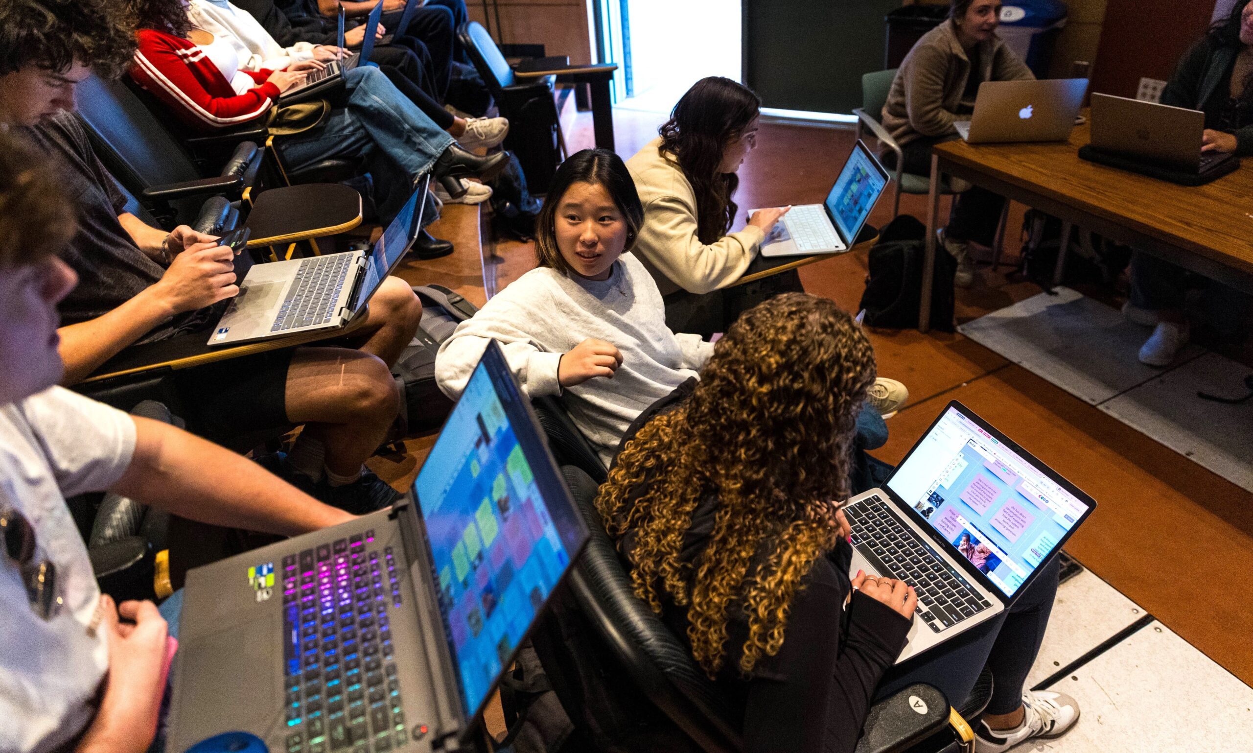 Students work on a project in Stern Neil’s marketing class