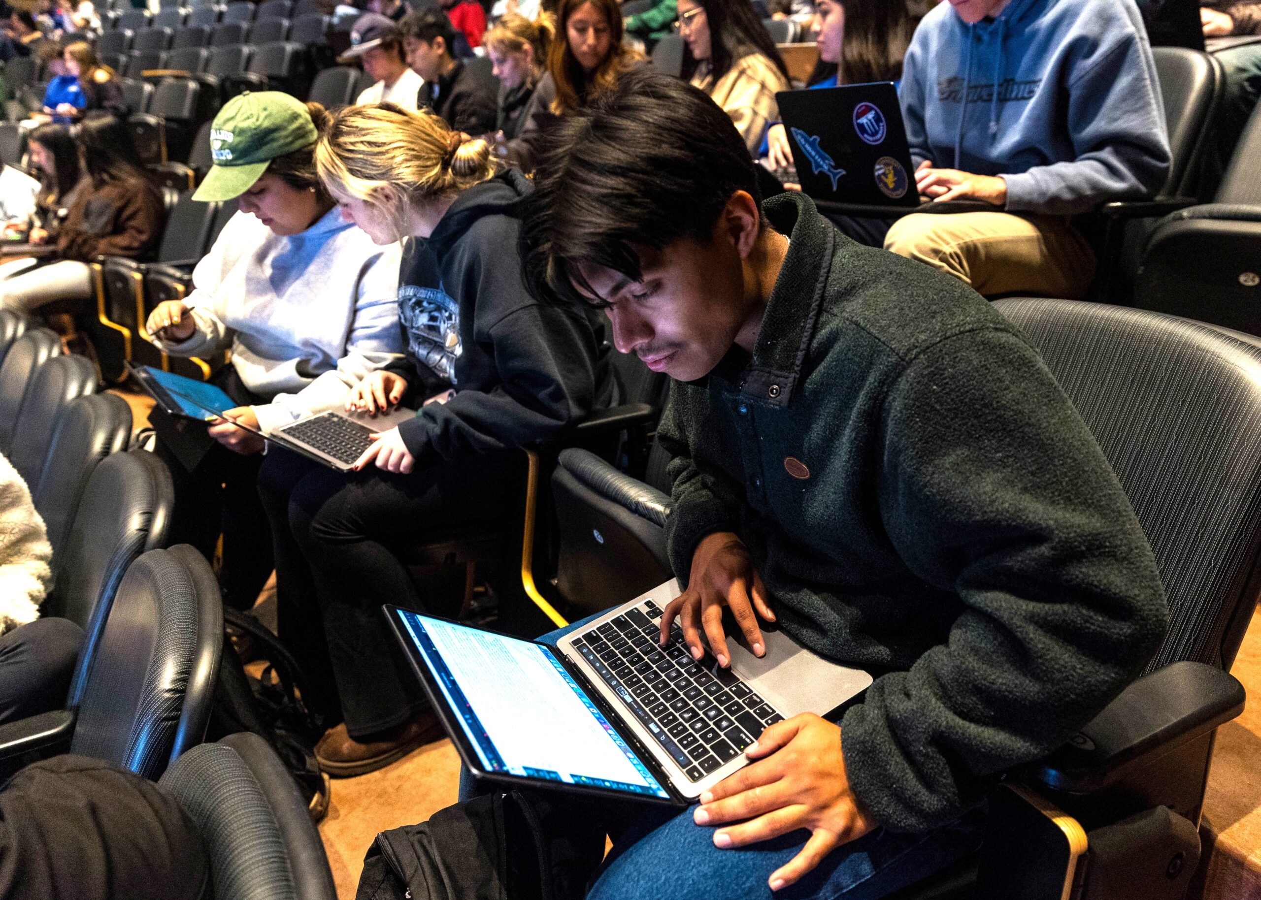 Students work on a project in Stern Neil’s marketing class