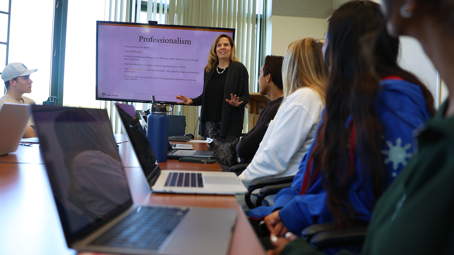 Lisa Sperow speaks to students in a clasroom