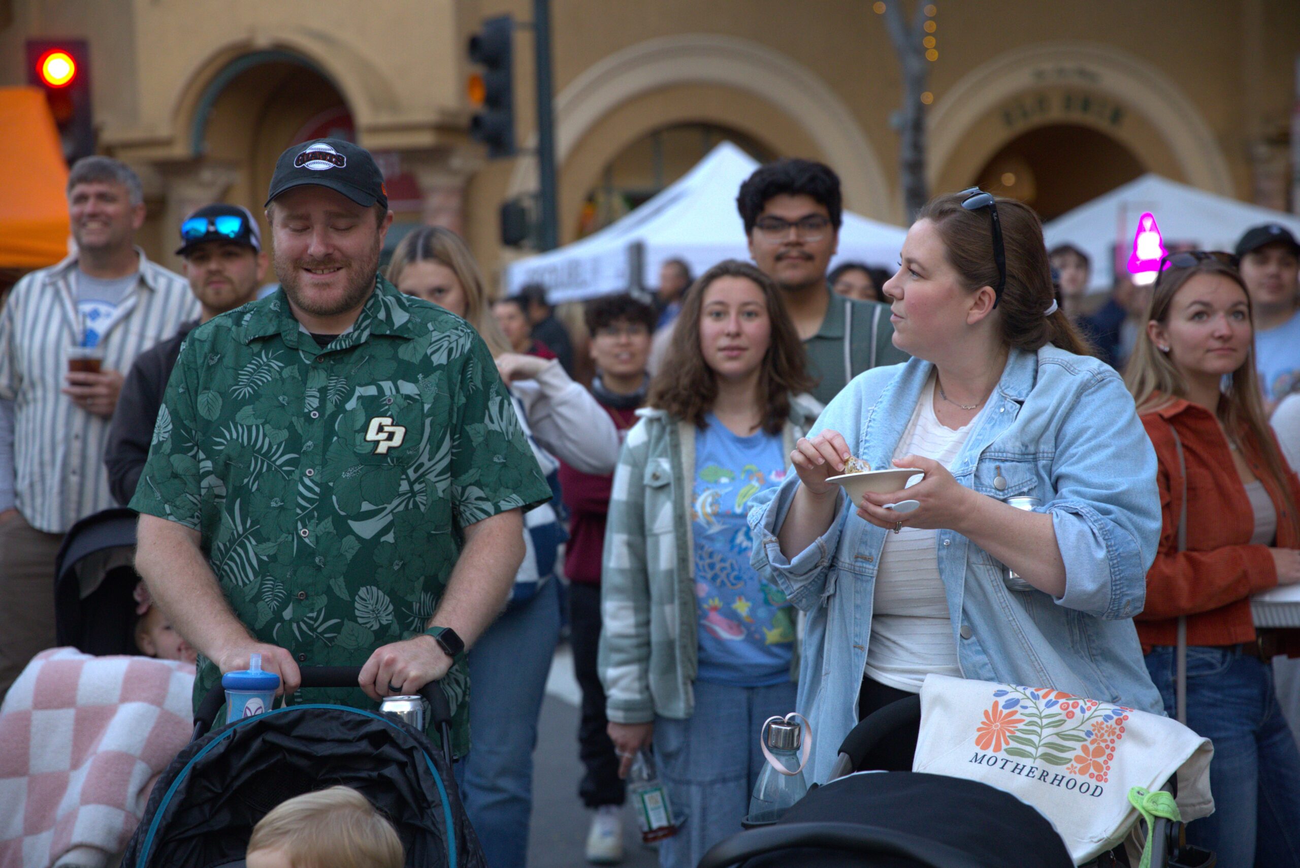 A crowd watches the egg drop contest at SLO Farmer's Market