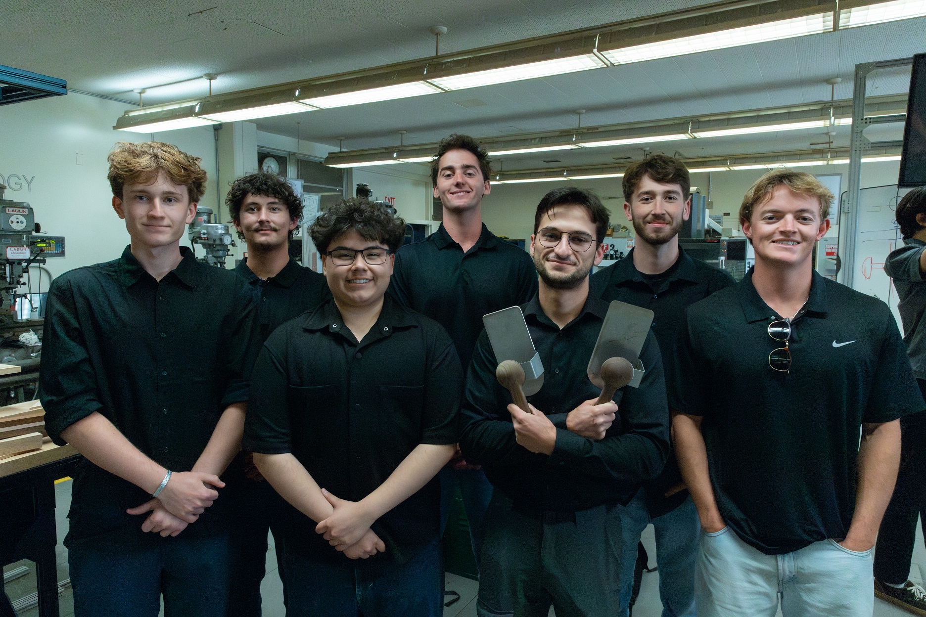 A capstone team poses for a portrait