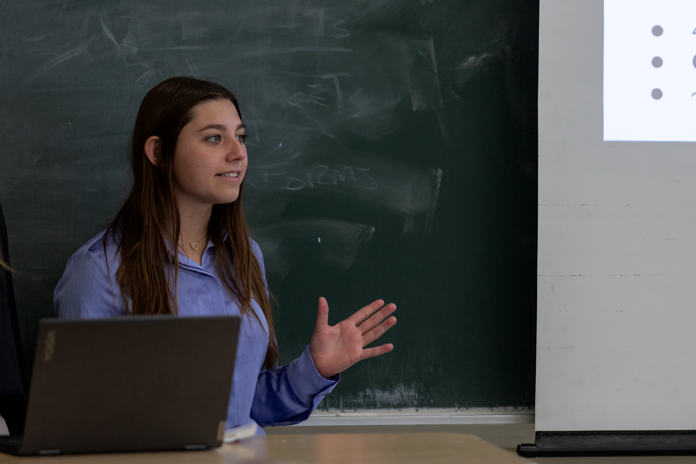 A student discusses her team's capstone project