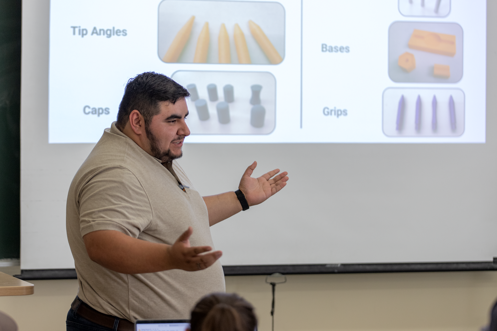 A student describes what's on a PowerPoint