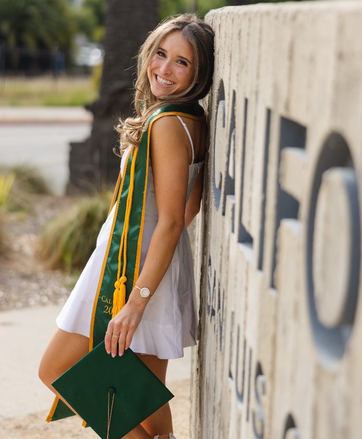 Gabrielle Gutierrez, senior portrait at Cal Poly sign