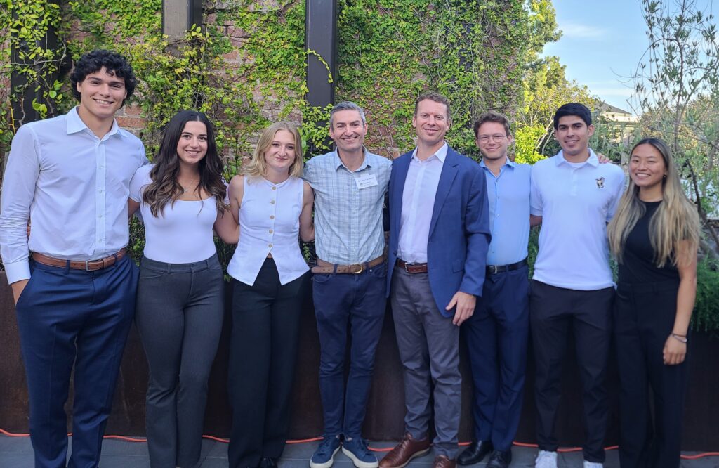 A group shot of students who were involved in the Student Managed Portfolio Project
