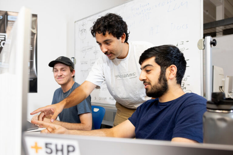 Startup founders work at the HotHouse