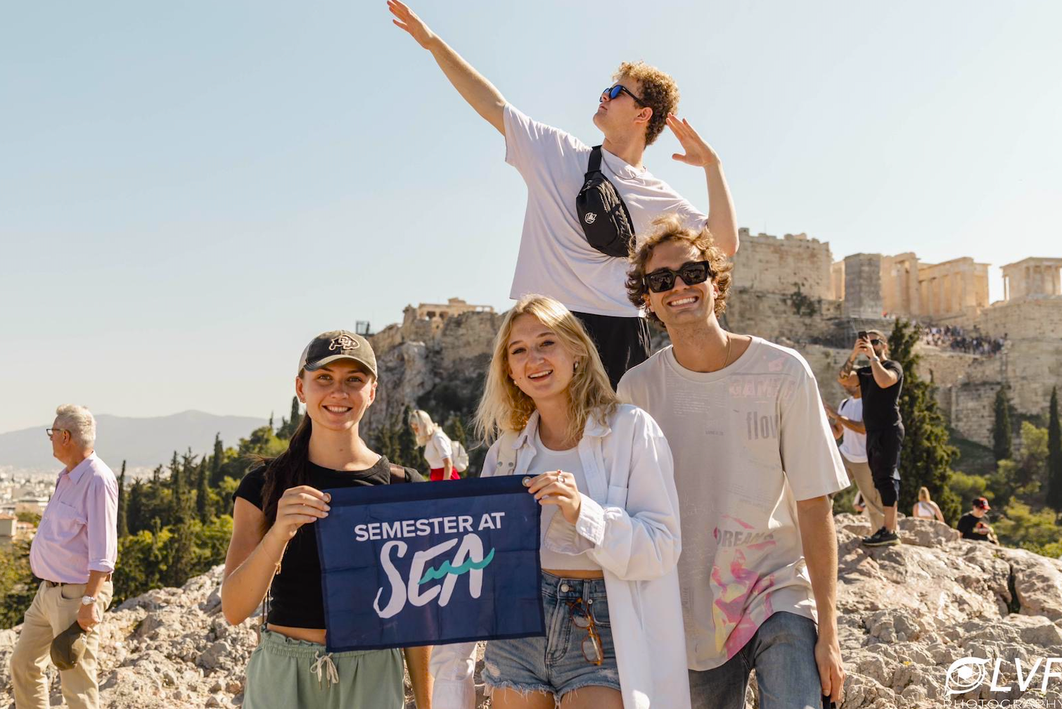 Students from the Semester at Sea pose for a photo in Greece