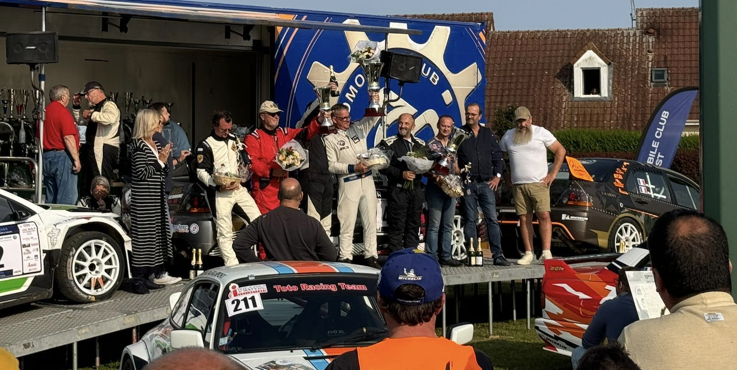 A trophy ceremony at a French car race